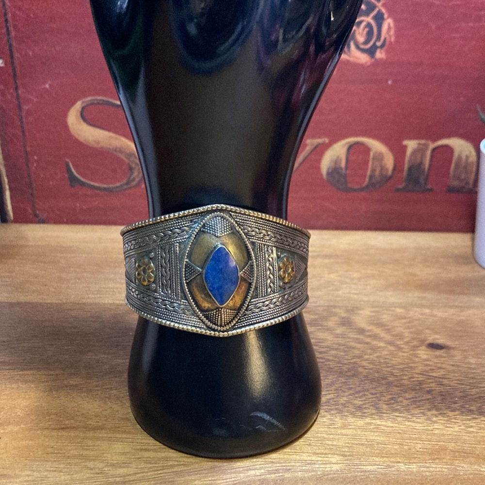 Antique cuff-style bangle bracelet with a Lapis Lazuli stone